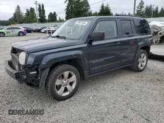 2014 Jeep Patriot Latitude z VIN 1C4NJPFA5ED633671, wystawiony jako Copart lot #59807245 z przebiegiem 185 316 mil mil oraz Szkoda całkowita • Salvage title. Historia ofert i sprzedaży dostępna na DreamBid. Obrazek 1.