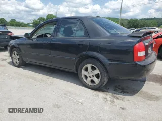 2002 Mazda Protege DX z VIN JM1BJ225020537013, wystawiony jako Copart lot #56952495 z przebiegiem 129 846 mil mil oraz Czysty tytuł • Clean title. Historia ofert i sprzedaży dostępna na DreamBid. Obrazek 2.