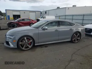 2015 Audi RS 7 Prestige z VIN WUAW2AFC0FN900729, wystawiony jako Copart lot #52392835 z przebiegiem 47 915 mil mil oraz Tytuł czysty. Historia ofert i sprzedaży dostępna na DreamBid. Obrazek 1.
