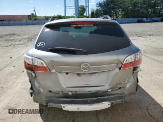 2012 Mazda CX-9 Grand Touring z VIN JM3TB3DV3C0335330, wystawiony jako Copart lot #57562015 z przebiegiem 171 397 mil mil oraz Szkody całkowita. Historia ofert i sprzedaży dostępna na DreamBid. Obrazek 6.