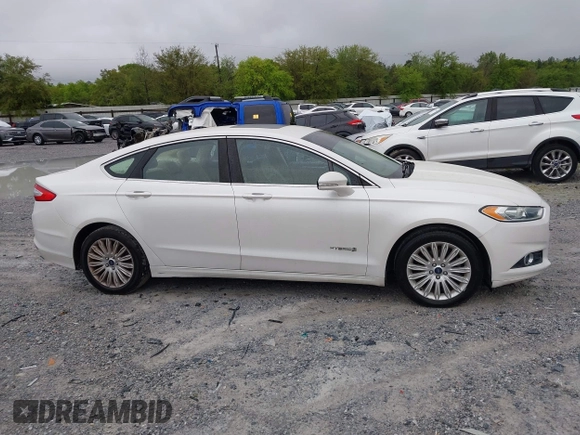 2014 Ford Fusion SE Hybrid with VIN 3FA6P0LU3ER312041, listed as a IAAI auction lot 41964588 with 138,566 mi miles and . Bid and sale history available at DreamBid. Image 13.