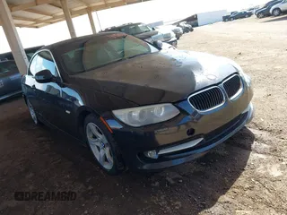 2013 BMW 3 Series 335i with VIN WBADX7C57DJ590238, listed as a IAAI auction lot 41920557 with 160,946 mi miles and . Bid and sale history available at carsss.com. Image 1.