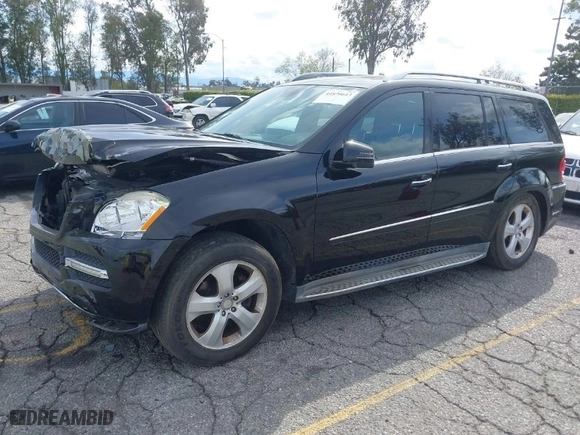 2012 Mercedes-Benz GL-Class GL 450 with VIN 4JGBF7BE6CA785983, listed as a IAAI auction lot 41870613 with 75,004 mi miles. Bid and sale history available at carsss.com. Image 2.