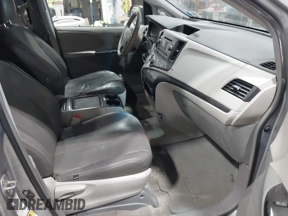 2013 Toyota Sienna LE with VIN 5TDJK3DC0DS056429, listed as a IAAI auction lot 41633193 with 167,321 mi miles and . Bid and sale history available at DreamBid. Image 5.