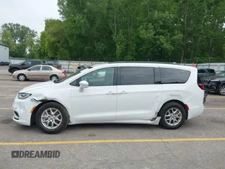 2022 Chrysler Pacifica Touring L with VIN 2C4RC1BG3NR149675, listed as a IAAI auction lot 42470593 with 59,956 mi miles and . Bid and sale history available at DreamBid. Image 14.