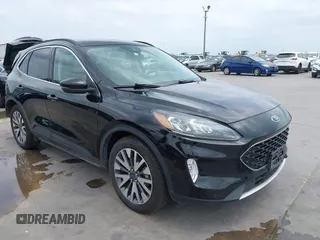 2020 Ford Escape Titanium z VIN 1FMCU9J94LUB16281, wystawiony jako IAAI lot #42145346 z przebiegiem 72 413 mil mil oraz . Historia ofert i sprzedaży dostępna na DreamBid. Obrazek 1.