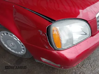 2004 Cadillac DeVille z VIN 1G6KD54Y14U144524, wystawiony jako IAAI lot #41960724 z przebiegiem Nie podano mil oraz . Historia ofert i sprzedaży dostępna na DreamBid. Obrazek 6.