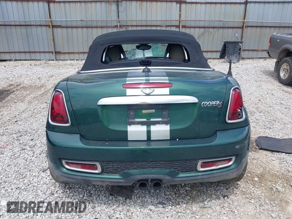2013 MINI Roadster S z VIN WMWSY3C55DT566134, wystawiony jako IAAI lot #42265800 z przebiegiem 170 001 mil mil oraz . Historia ofert i sprzedaży dostępna na DreamBid. Obrazek 16.