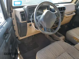 1999 Jeep Wrangler Sport with VIN 1J4FY19S7XP464377, listed as a Copart auction lot 73062074 with 89,915 mi miles and Salvage Title. Bid and sale history available at carsss.com. Image 8.