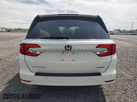 2019 Honda Odyssey Touring z VIN 5FNRL6H80KB501681, wystawiony jako Copart lot #58814945 z przebiegiem 105 287 mil mil oraz Szkoda całkowita • Salvage title. Historia ofert i sprzedaży dostępna na DreamBid. Obrazek 6.