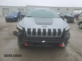 2014 Jeep Cherokee Trailhawk with VIN 1C4PJMBS1EW240177, listed as a Copart auction lot 43321715 with 212,339 mi miles and Salvage title. Bid and sale history available at DreamBid. Image 5.