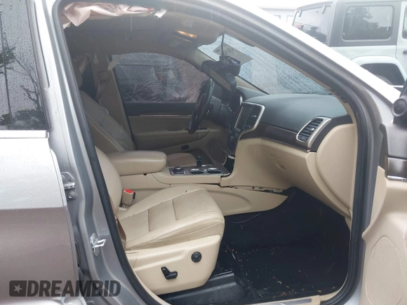 2014 Jeep Grand Cherokee Limited with VIN 1C4RJFBT1EC200888, listed as a IAAI auction lot 42435488 with 117,691 mi miles and . Bid and sale history available at DreamBid. Image 5.