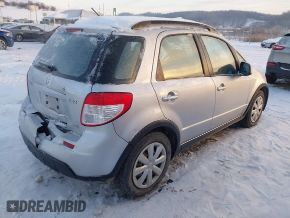 2011 Suzuki SX4 Crossover with VIN JS2YB5A36B6305317, listed as a IAAI auction lot 41333007 with 84,967 mi miles. Bid and sale history available at carsss.com. Image 4.