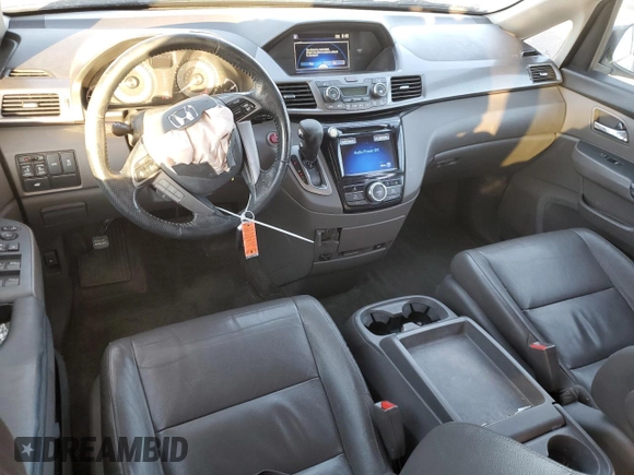 2015 Honda Odyssey EX-L with VIN 5FNRL5H69FB077433, listed as a Copart auction lot 88999285 with 193,926 mi miles and Salvage Title. Bid and sale history available at DreamBid. Image 8.