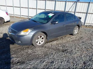 2009 Nissan Altima 2.5 with VIN 1N4AL21E99N538882, listed as a IAAI auction lot 42119130 with 154,146 mi miles. Bid and sale history available at carsss.com. Image 1.