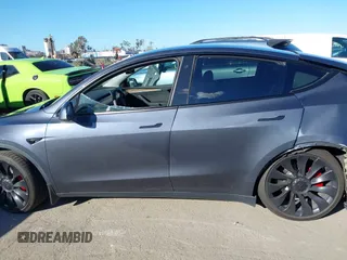 2022 Tesla Model Y Performance with VIN 7SAYGDEF7NF562895, listed as a IAAI auction lot 41692864 with 29,904 mi miles and . Bid and sale history available at DreamBid. Image 13.
