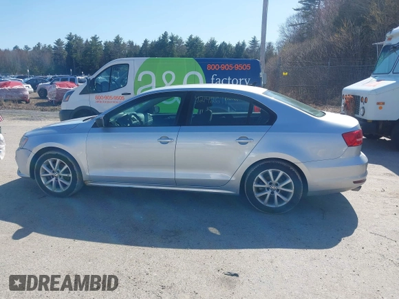 2015 Volkswagen Jetta Sedan 1.8T SE with VIN 3VWD17AJ0FM329783, listed as a IAAI auction lot 42142611 with 217,610 mi miles. Bid and sale history available at carsss.com. Image 12.