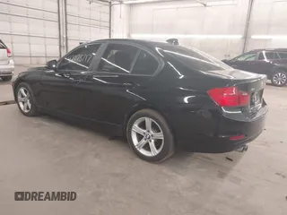 2014 BMW 3 Series 328i xDrive with VIN WBA3B3C5XEJ980450, listed as a IAAI auction lot 42078717 with 108,763 mi miles. Bid and sale history available at carsss.com. Image 3.