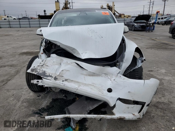 2023 Tesla Model Y Long Range z VIN 7SAYGDEE9PA070232, wystawiony jako Copart lot #55881805 z przebiegiem 38 276 mil mil oraz Szkoda całkowita • Salvage title. Historia ofert i sprzedaży dostępna na DreamBid. Obrazek 5.