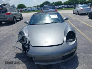 2007 Porsche Boxster z VIN WP0CA29877U710966, wystawiony jako IAAI lot #39794748 z przebiegiem 147 803 mil mil oraz . Historia ofert i sprzedaży dostępna na DreamBid. Obrazek 12.