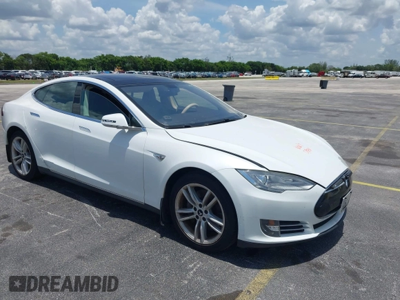 2013 Tesla Model S with VIN 5YJSA1CG4DFP21658, listed as a IAAI auction lot 42398609 with 116,068 mi miles and . Bid and sale history available at DreamBid. Image 1.