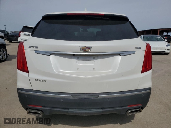 2019 Cadillac XT5 Premium Luxury FWD z VIN 1GYKNERS6KZ230100, wystawiony jako Copart lot #46347885 z przebiegiem 40 188 mil mil oraz Szkody całkowita. Historia ofert i sprzedaży dostępna na DreamBid. Obrazek 6.