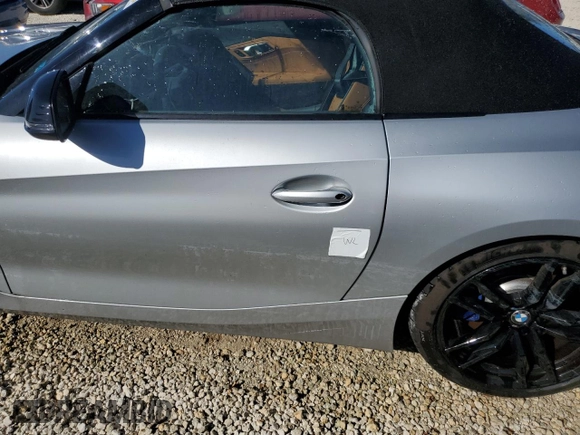 2022 BMW Z4 sDrive30i with VIN WBAHF3C03NWX80169, listed as a Copart auction lot 74791084 with 0 mi miles and Salvage Title. Bid and sale history available at carsss.com. Image 12.