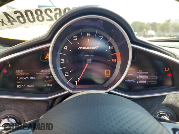 2016 McLaren 650S z VIN SBM11FAA6GW006251, wystawiony jako Copart lot #70628064 z przebiegiem 13 452 mil mil oraz Szkody całkowita. Historia ofert i sprzedaży dostępna na DreamBid. Obrazek 9.