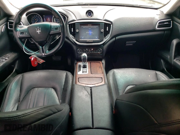 2014 Maserati Ghibli S Q4 with VIN ZAM57RTA8E1083877, listed as a Copart auction lot 57812725 with 94,088 mi miles and Clean title. Bid and sale history available at DreamBid. Image 8.
