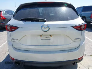 2018 Mazda CX-5 Grand Touring with VIN JM3KFADM8J0373368, listed as a IAAI auction lot 42013535 with 63,142 mi miles and . Bid and sale history available at DreamBid. Image 16.