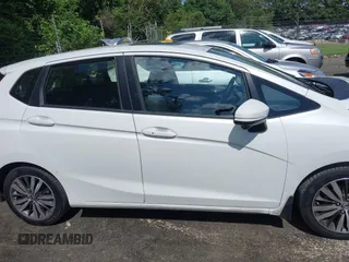 2016 Honda Fit EX z VIN JHMGK5H78GX014803, wystawiony jako IAAI lot #42539208 z przebiegiem 79 433 mil mil oraz . Historia ofert i sprzedaży dostępna na DreamBid. Obrazek 13.