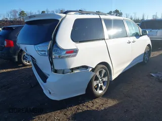 2014 Toyota Sienna SE with VIN 5TDXK3DC1ES503751, listed as a IAAI auction lot 41709975 with 229,771 mi miles and . Bid and sale history available at DreamBid. Image 4.