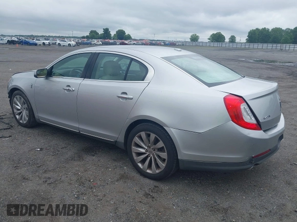 2013 Lincoln MKS с VIN 1LNHL9DK3DG604712, выставлен на аукционе IAAI как лот 42351237 с пробегом 144 927 миль миль и . История ставок и продаж доступна на DreamBid. Изображение 3.