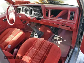1988 Ford Bronco z VIN 1FMCU14T2JUA39593, wystawiony jako Copart lot #76556764 z przebiegiem Nie podano mil oraz Szkoda całkowita • Salvage title. Historia ofert i sprzedaży dostępna na DreamBid. Obrazek 8.