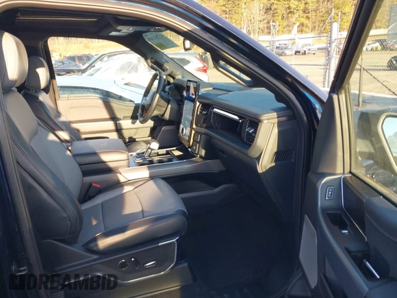 2023 Ford F-150 Lightning Pro with VIN 1FT6W1EV7PWG33511, listed as a IAAI auction lot 41761149 with 10,501 mi miles and . Bid and sale history available at DreamBid. Image 5.