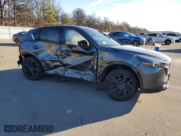 2022 Mazda CX-5 2.5 Turbo with VIN JM3KFBAY2N0596945, listed as a Copart auction lot 86427694 with Not Provided miles and Salvage Title. Bid and sale history available at carsss.com. Image 4.