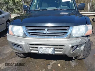 2002 Mitsubishi Montero XLS z VIN JA4MW31R52J070132, wystawiony jako IAAI lot #41782522 z przebiegiem 92 575 mil mil oraz . Historia ofert i sprzedaży dostępna na DreamBid. Obrazek 17.