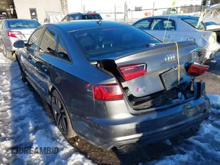 2016 Audi S6 Premium Plus with VIN WAUF2AFC3GN162503, listed as a IAAI auction lot 41451887 with 91,879 mi miles. Bid and sale history available at carsss.com. Image 3.