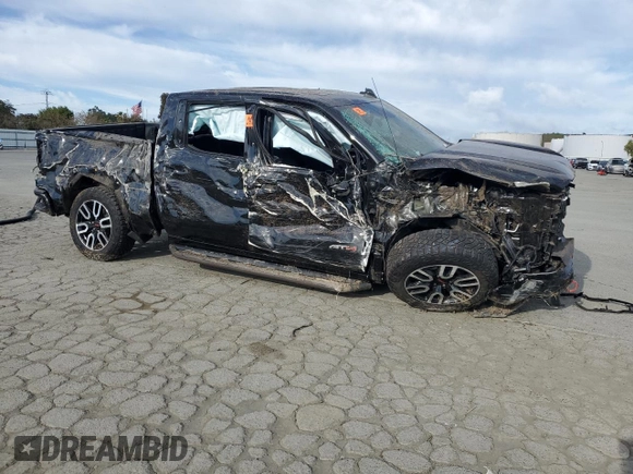 2024 GMC Sierra 1500 AT4 with VIN 3GTUUEEL0RG284440, listed as a Copart auction lot 52765005 with Not provided miles and Salvage title. Bid and sale history available at DreamBid. Image 4.