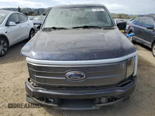 2022 Ford F-150 Lightning Pro z VIN 1FTVW1EL9NWG10318, wystawiony jako Copart lot #47857805 z przebiegiem 33 470 mil mil oraz Szkoda całkowita • Salvage title. Historia ofert i sprzedaży dostępna na DreamBid. Obrazek 5.
