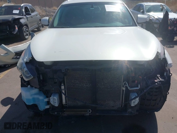 2014 Infiniti QX70 with VIN JN8CS1MW7EM413033, listed as a IAAI auction lot 41993136 with 148,838 mi miles and . Bid and sale history available at DreamBid. Image 13.