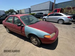 2000 Ford Escort Fleet z VIN 3FAFP13PXYR258385, wystawiony jako Copart lot #57472665 z przebiegiem 79 947 mil mil oraz Tytuł czysty. Historia ofert i sprzedaży dostępna na DreamBid. Obrazek 1.