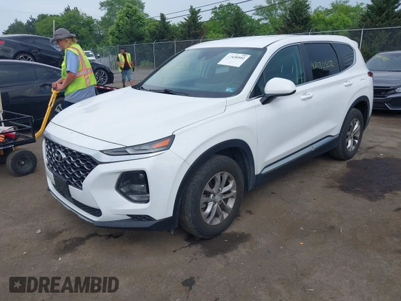 2019 Hyundai Santa Fe SE with VIN 5NMS23AD7KH111542, listed as a IAAI auction lot 42430502 with 78,755 mi miles and . Bid and sale history available at DreamBid. Image 2.