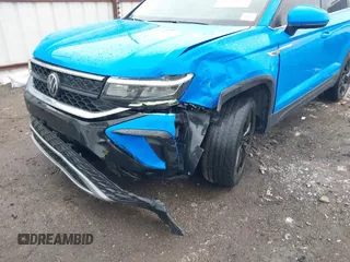 2023 Volkswagen Taos SE z VIN 3VVNX7B28PM305652, wystawiony jako IAAI lot #41892522 z przebiegiem 50 644 mil mil oraz . Historia ofert i sprzedaży dostępna na DreamBid. Obrazek 6.