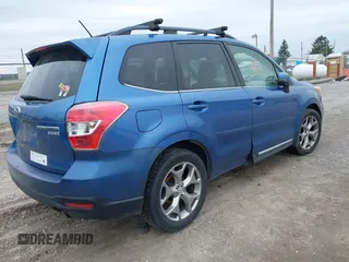 2015 Subaru Forester 2.5i Touring with VIN JF2SJAWC9FH415634, listed as a IAAI auction lot 41954673 with 140,507 mi miles. Bid and sale history available at carsss.com. Image 4.