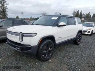 2025 Rivian R1S Adventure with VIN 7PDSGBBAXSN062963, listed as a IAAI auction lot 41598597 with 1,192 mi miles. Bid and sale history available at carsss.com. Image 19.