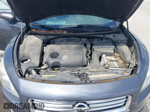 2013 Nissan Maxima SV z VIN 1N4AA5AP2DC831021, wystawiony jako IAAI lot #42255349 z przebiegiem 143 373 mil mil oraz . Historia ofert i sprzedaży dostępna na DreamBid. Obrazek 10.