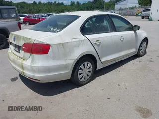 2013 Volkswagen Jetta S with VIN 3VW2K7AJ9DM265129, listed as a IAAI auction lot 42562999 with 179,137 mi miles and . Bid and sale history available at DreamBid. Image 4.