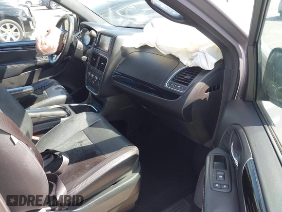 2014 Dodge Grand Caravan SXT with VIN 2C4RDGCGXER261467, listed as a IAAI auction lot 41801810 with 97,322 mi miles and . Bid and sale history available at DreamBid. Image 5.