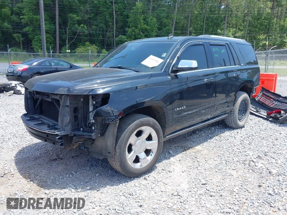 2015 Chevrolet Tahoe LTZ z VIN 1GNSCCKC8FR121461, wystawiony jako IAAI lot #42407901 z przebiegiem 137 729 mil mil oraz . Historia ofert i sprzedaży dostępna na DreamBid. Obrazek 2.